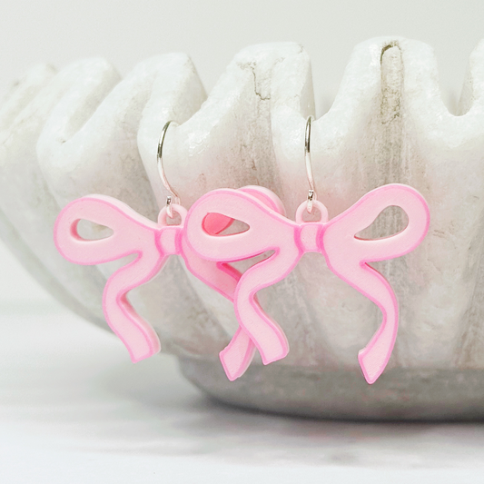 Cute pink bow earrings – lightweight and playful accessories for girls and tweens